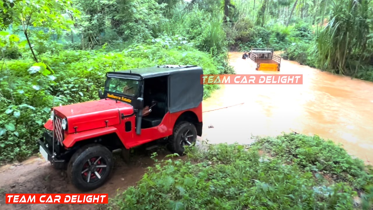 Mahindra CJ3B Jeep Rescuing Mahindra Bolero Pick-up Truck